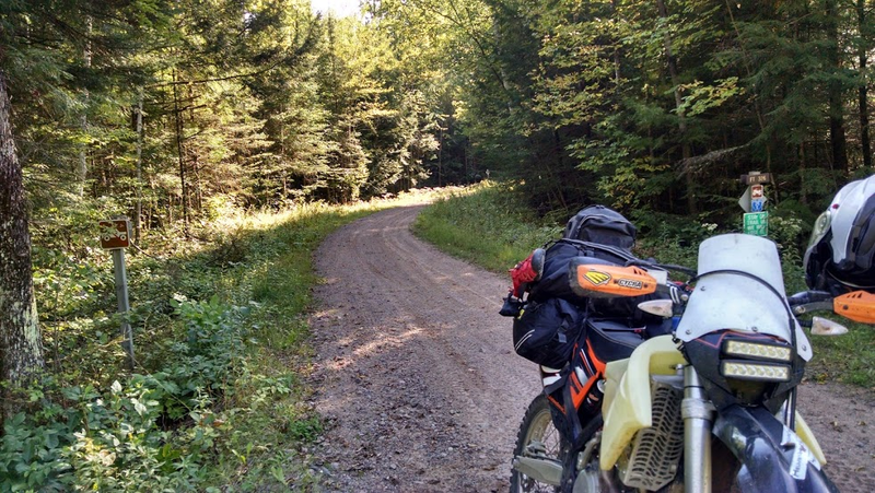Illustration for article titled Don’t Be Late! 2 Singles and a Twin KTM Ride the TWAT Day 2